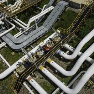 Top view male worker inspection at valve of visual check record pipeline oil and gas industry